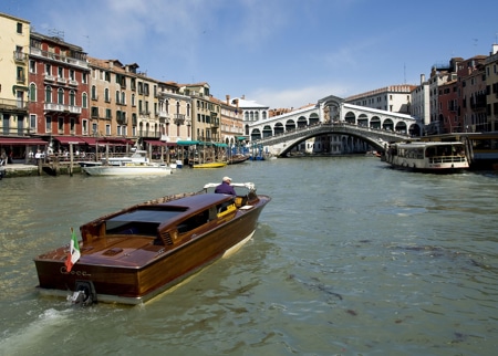 Water Taxi approaching Rialto Bridge on Grand Canal